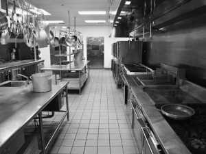 Black and white image of restaurant kitchen