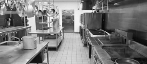 Black and white image of a kitchen