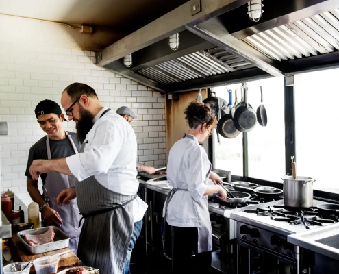 Chef and crew working in ths kitchen