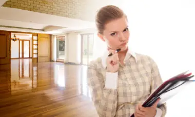 Thinking woman with background of house interior