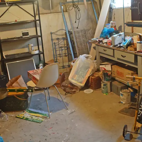 Messy basement with a lot of clutter
