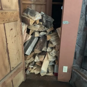 Stack of fire wood in a storage room