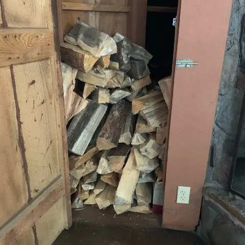 Stack of fire wood in a storage room